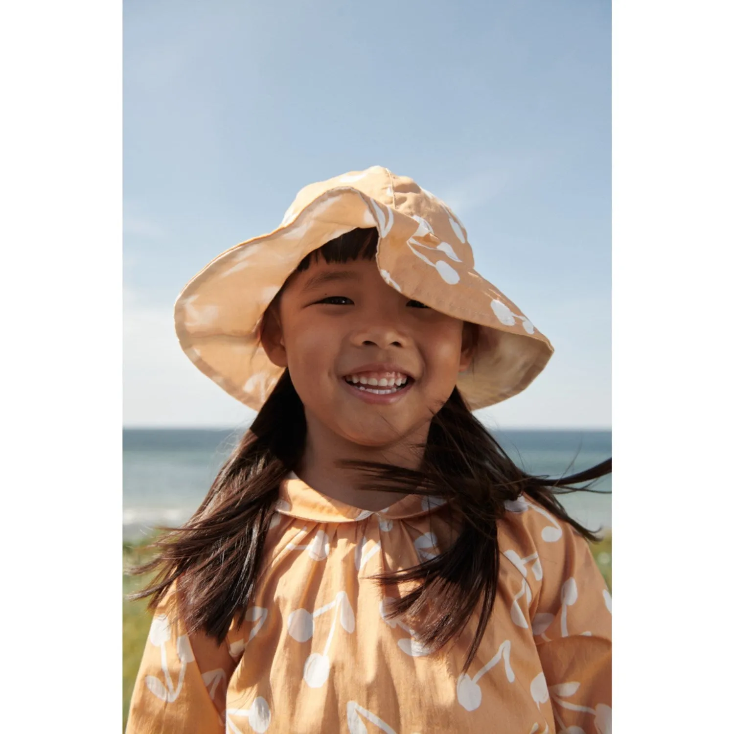 LIEWOOD Cherry Blossom / Light Apricot Amelia Reversible Sun hat